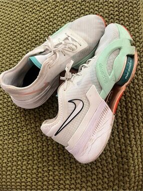 Nike Women's White Running Shoes with Mint and Coral Accents